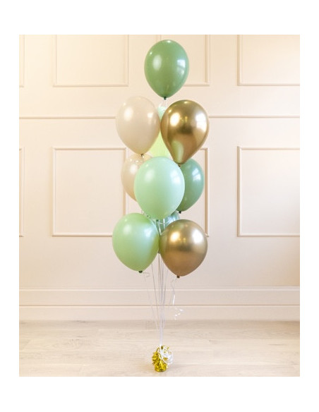 Bouquet de ballons Mix Vert et Or en intérieur, avec liens et petit poids au pied.